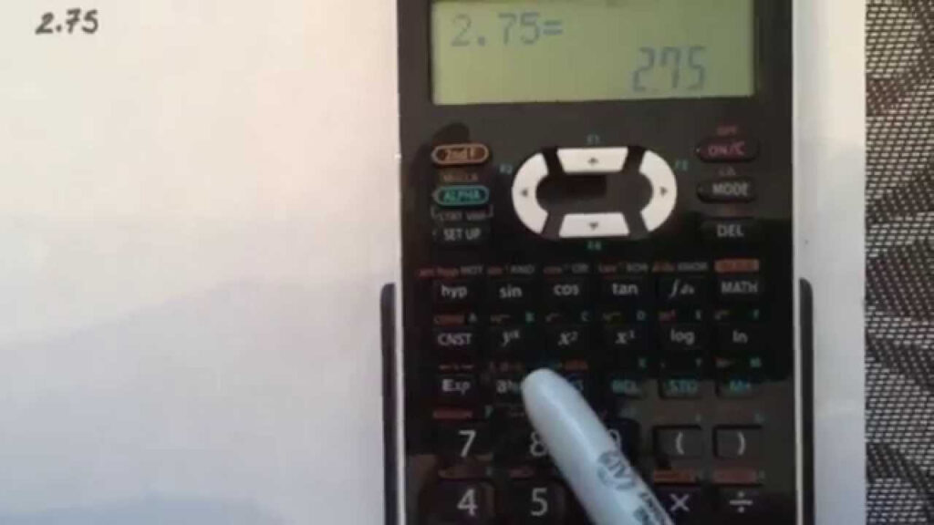 Converting A Decimal To A Fraction Using A Calculator Sharp EL 520X 